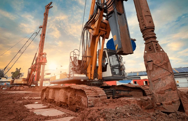 hydraulic-pile-drilling-machine-worker-600nw-1937766418